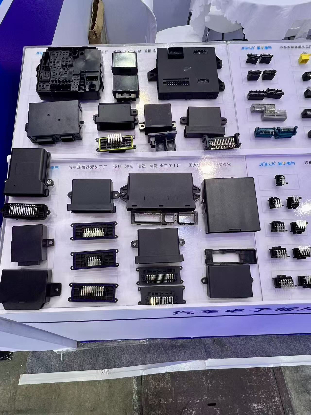 Automotive electronic control unit housings with integrated connector headers for BCM and ADAS controllers